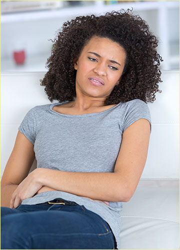 Woman with Upset Stomach